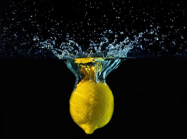 adding lemon to water